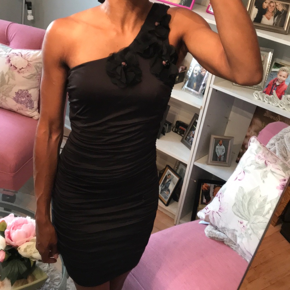 One shoulder black dress with flower detail